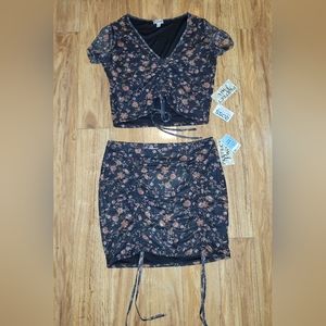 Brand new with tags matching skirt/top set! Size XL stretchy and flattering